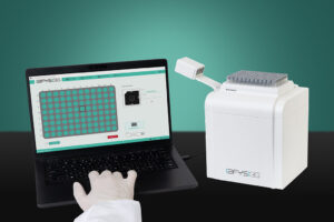AFYS3G's Delta50 next to a laptop being worked on by a gloved hand